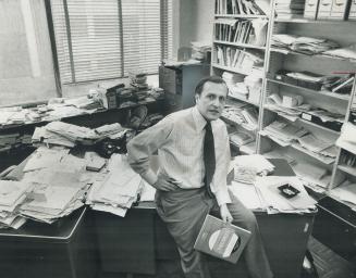 Abraham Rotstein, a founder of the Committee for an Independent Canada and author of a book on foreign ownership, does most of his work in a paper-str(...)