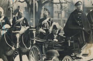 Riding to open the Ontario Legislature, Lieutenant-Governor Earl Rowe, flanked by horse guards, was like a new bride with something old, something bor(...)