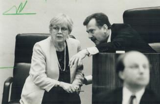 Top-Level talk: Toronto Mayor June Rowlands and Metro Chairman Alan Tonks confer during Metro Council's debate yesterday on the rioting this week in downtown Toronto