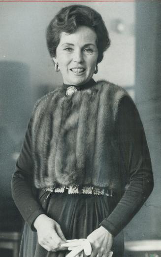 Mrs. Jan Rubes, Opera star's wife. She wears ranch mink bolero made from old stole