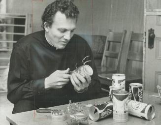 Rev. Robert Rumball of the Ontario Mission of the deaf. He demonstrates a technique for turning empty cans into chair models