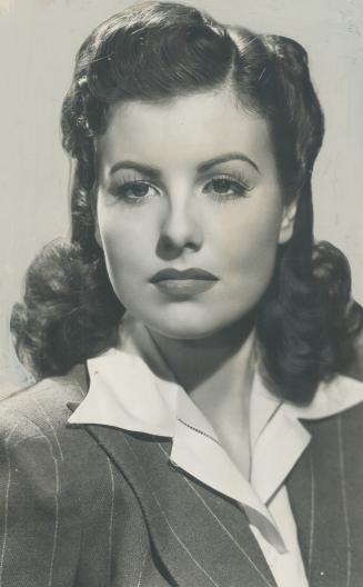 Sheila Ryan, Kansas-born screen actress, announces that she is seeking a divorce from her husband, Allan Lane, cowboy actor, claiming: It's just we're not compatible