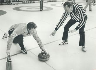 Has it come to this? Sgt. Bud Perry of Metro police blows the whistle for a curling rules infraction on skip Paul Savage, who is over the hog line. We(...)