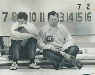 A study in dejection are Chris Johnson and skip Paul Savage, whose rink was favored to win the provincial curling title for the third time. Savage's r(...)