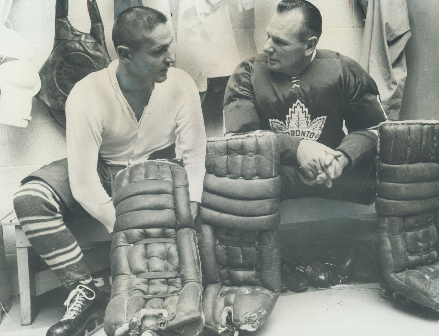 Terry Sawchuk (left) finds willing ear for account of operation