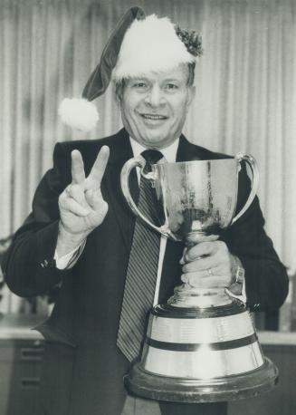 Toronto Argonaut general manager Ralph Sazio and the Grey Cup