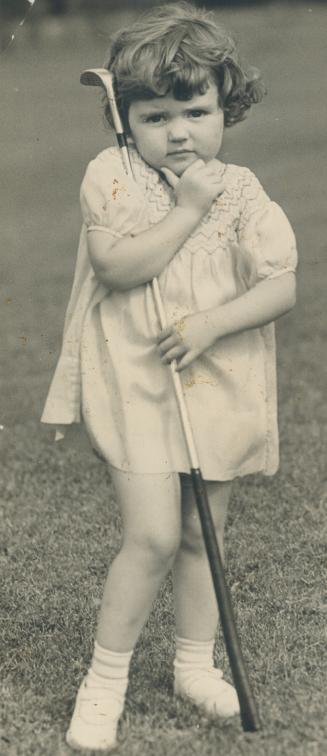 Joanne Scadding accompanies her father on the golf course while he plays to stimulate circulation in feet seriously injured in the Moose River Mine tragedy