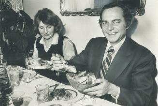 Ed Schreyer and his wife, Lily, enjoy a Ukrainian dinner while visiting an uncle in Toronto