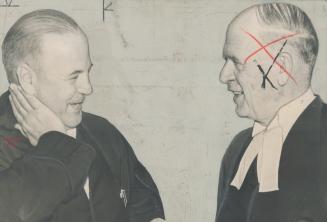 Presiding over the court is Mr. Justice W. F. Scroeder, left, seen here with special prosecutor T. J. Rigney. William Bohozuk and Donald MacLean, fath(...)