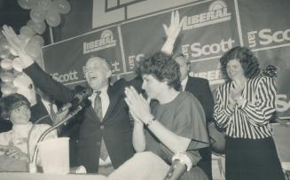 Celebrating victory are Liberals Dianne Poole, left, considered cabinet material, Ian Scott, who defeated Tory Susan Fish, and Chaviva Hosek