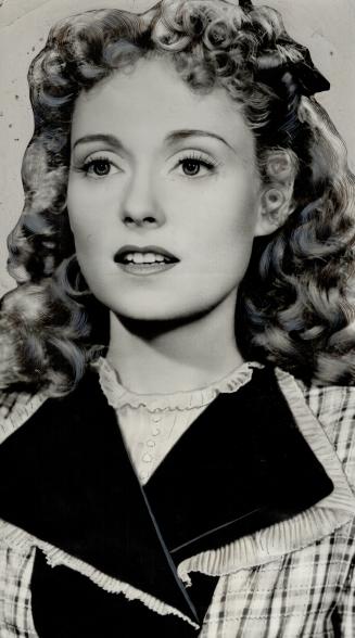 Sweet sixteen-Actress Martha Scott, in Cheers For Miss Bishop starts for school in gingham and hair ribbons
