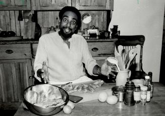 Barbecue performance: Musician Joe Sealy gets excited over the ingredients for his lemon ribs - one of the truly great barbecue rib recipes