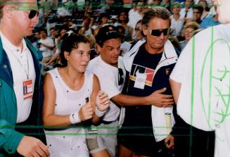 Monica Seles and father (right) groups