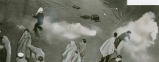 Bursting among rioting prisoners at the Ontario reformatory, Guelph, tear gas bombs help quell violence