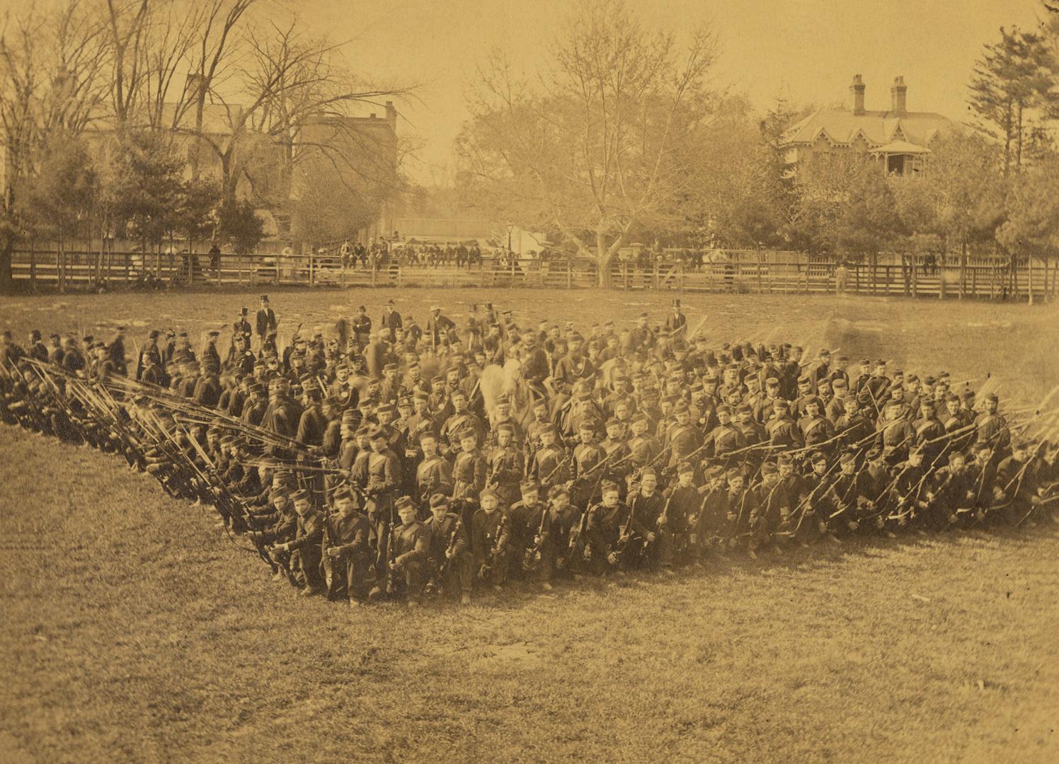 Queen's Own Rifles, in battle square formation, perhaps in grounds of Normal School, Toronto, Ontario