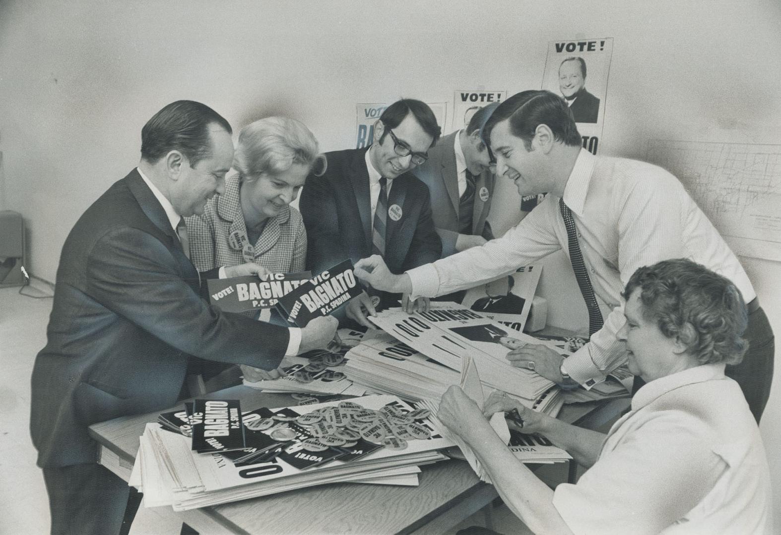 Tory candidate Vic Bagnato (left) and his campaign workers sort out a consignment of campaign Bumpf, Their bumper stickers, posters and tin buttons come from William J. Brennan, who says he's one of the little guys