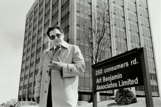 Closing up shop: Art Benjamin, president of Art Benjamin Associates Ltd., stands in front of his old office building.