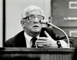 This gentleman, testifying at Grrange inquiry Nov. 8, '83 is Dr. Harry Bain, a former chief pediatrician at the Hospital for Sick Children. He has now finished his testimony but we could not course.