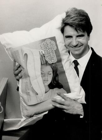 Dream-wave: Maurice Bard hugs one of the Dream-Wave pillows he invented after spending thousands on prototype models.