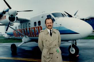 Flying high: Curtis Begg, above, president of Skywalker Airlines, and partner Albert Friedberg, both football fans, started up the Toronto Island based airline as a faster way to get to Buffalo Bills games.