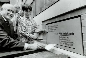 Firm foundation, Patient Jason Mirands, 10, helps Allan Beattie, chairman of the Hospital for Sick Children, lay the cornerstone yesterday for a new 550-bed wing, to open in 1993. The stone is from a children's hospital in London, England.