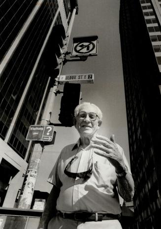 Memory still green: Traffic expert Bob Burton, 94, standing at the corner of Yonge and Bloor Sts., recalls when Toronto's first traffic lights were installed on August 8, 1925.