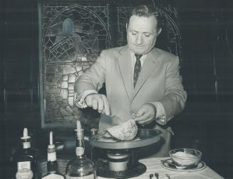 Henry Capri, a Maitre D' at the Royal York was born in Italy and retains a love of the food of his native land. On Sundays he makes a special meal for this family. The sauce for crepes suzette he makes at hotel is famous around the world. Here he demonstrates the ease with which he makes it.