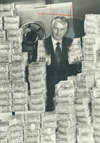 Cool cash representing the United Way's $16.2 million goal surrounds campaign chairman William Christener deep in vaults of a Metro Bank. There is is folks . . . that's exactly what we need. Let's go out and get it, Christener said as he kicked off campaign early yesterday for the media. Official appeal kick-off starts tomorrow at 11 a.m. at Nathan Phillips Square and you're invited.