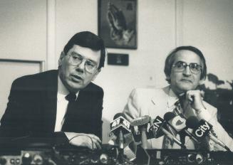 Press conference: United Church clergy and delegates held a meeting earlier this month at the Central United Church on Weston Rd., opposing the ordination of homosexuals in the church. From left, Rev. Allen Churchill and Rev. Bill Fritz at a press conference after the meetings.