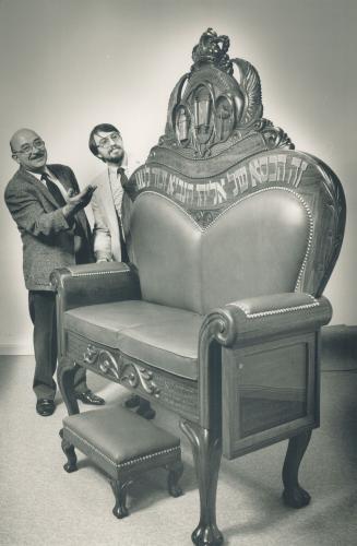 Craftsman: Pasquale Cosentino, left, built this ceremonial chair for a Thornhill synagogue from sketches made by artist Ron Henig.