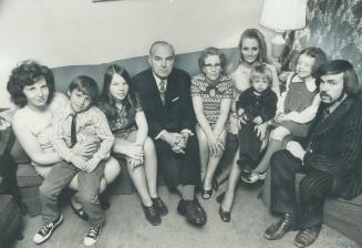 Mr. and Mrs. Arthur Cleland with their family (from left) Mrs. Margaret Newhook, Russell Newhook, 6, Kathlene Cleland, 15, Mr. and Mrs. Cleland, daughter-in-law Paula Cleland, grandchildren Stephen and Belynda Cleland and son Leonard. Mrs. Cleland was separated from her sisters, Gwendolyn and Pauline, 41 years ago. She hopes to find them.