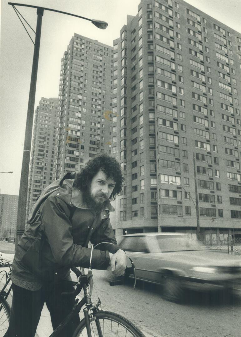 Just ride on by, environmentalist Gerard Coffey scoffs as he averts his eyes from the Harbor Terrace condos on Queen's Quay. Born in England, Coffey has lived in Toronto since 1969, graduated from Ontario College of Art. He is co-ordinator for Pollution Probe's Ecology House.