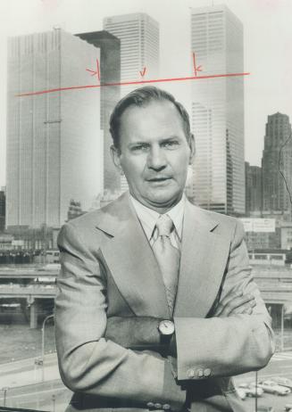 Work is one of my hobbies, says chartered accountant Harold Crosby, photographed against the Toronto skyline on his way from Halifax to Edmonton to become president of Canadian Chamber of Commerce. Chamber's commitment to national unity is a firm as its opposition to controls.