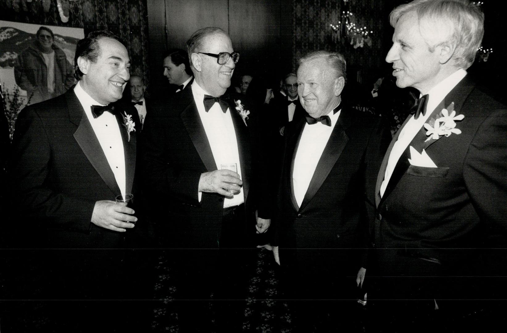 $125-a-plate dinner honors Toronto man. The Ben-Gurion University of the Negev tribute dinner for Toronto resident Ron Oelbaum, held at the Inn on the Park last night, boasted a distinguished guest list. Seen chatting are, from left: Sidney Chelsky, Canadian associate of the university, Abba Eban, Israel's former minister of foreign affairs, Morris Kaufman, committee chairman, and Martin Offman, chairman of the dinner.