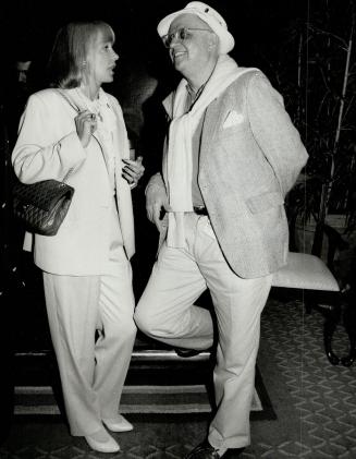 Left, producer Margo Lane with Hollywood reporter George Christy, who wears his Tilley hat everywhere.