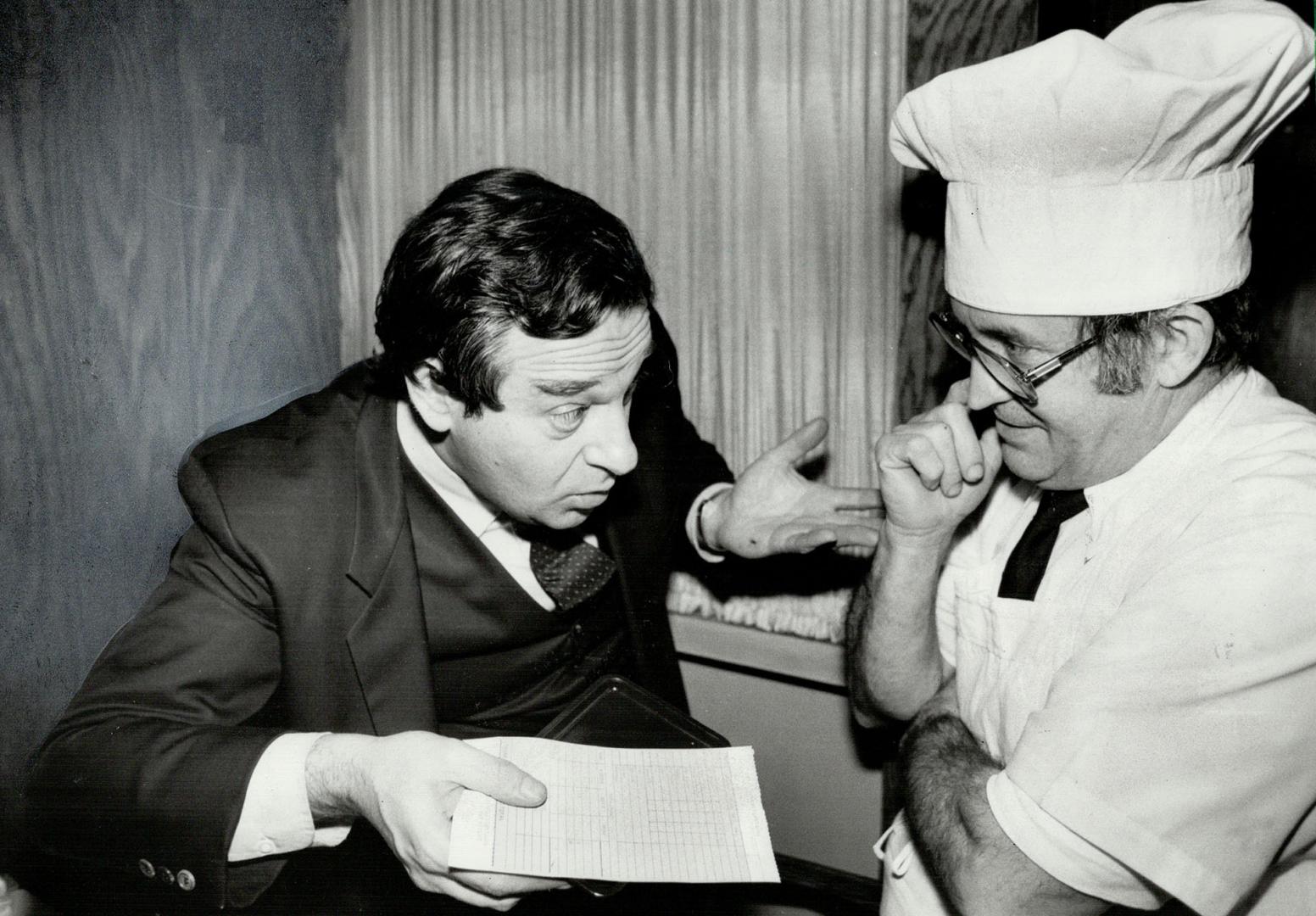About this bill?: Herb Cohen bargains with owner-chef Eddy Marlet of Seniors Dining Nook about his dinner bill. He didn't reveal who won. Cohen was the consultant who successfully negotiated release for U.S. hostages in Iran.