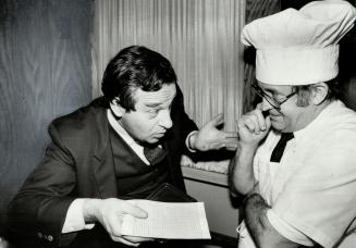 About this bill?: Herb Cohen bargains with owner-chef Eddy Marlet of Seniors Dining Nook about his dinner bill. He didn't reveal who won. Cohen was the consultant who successfully negotiated release for U.S. hostages in Iran.