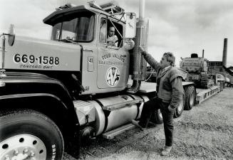 Rolling along: Nick Cortellucci talks to a driver leaving the Four Valleys service yard in Concord.