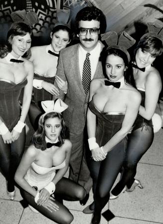 Surrounded: Buffalo Playboy Club co-owner Patrick Consentino, who wants to open a club in Toronto, is surrounded by bunnies every day he goes to work. Jennifer and Bubbles, front left and right, along with Maureen, left, Michelle, holding his arm, and Janice must observe strict club rules-and that includes no dating.