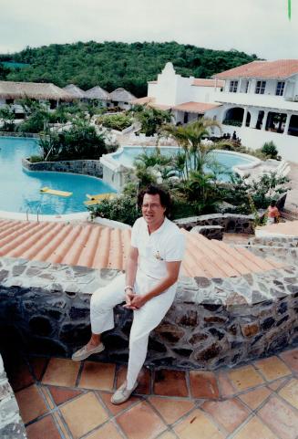 Landscape and its Architect: David Cram, partner with his father-in-law, Don Smith of Ellis-Don Ltd., In a luxury holiday resort on St. Lucia island, near Barbados, seems to be comfortably settled in paradise-like surroundings.