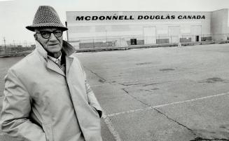 Toll of lay-off: Former UAW Local 1967 president, Allan Craig, now retired, stands in empty parking lot at McDonnell Douglas. Craig, 73, says the average man and woman are getting angry with the economy and politicians are a wee bit scared. Nearly everyone is standing up and saying something.