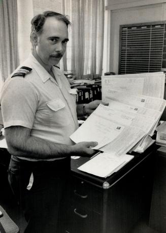 Whats This? Major Jim Craig was bemused when instead of a form to change his payroll deductions, Revenue Canada sent him a batch of completed personal exemption forms.