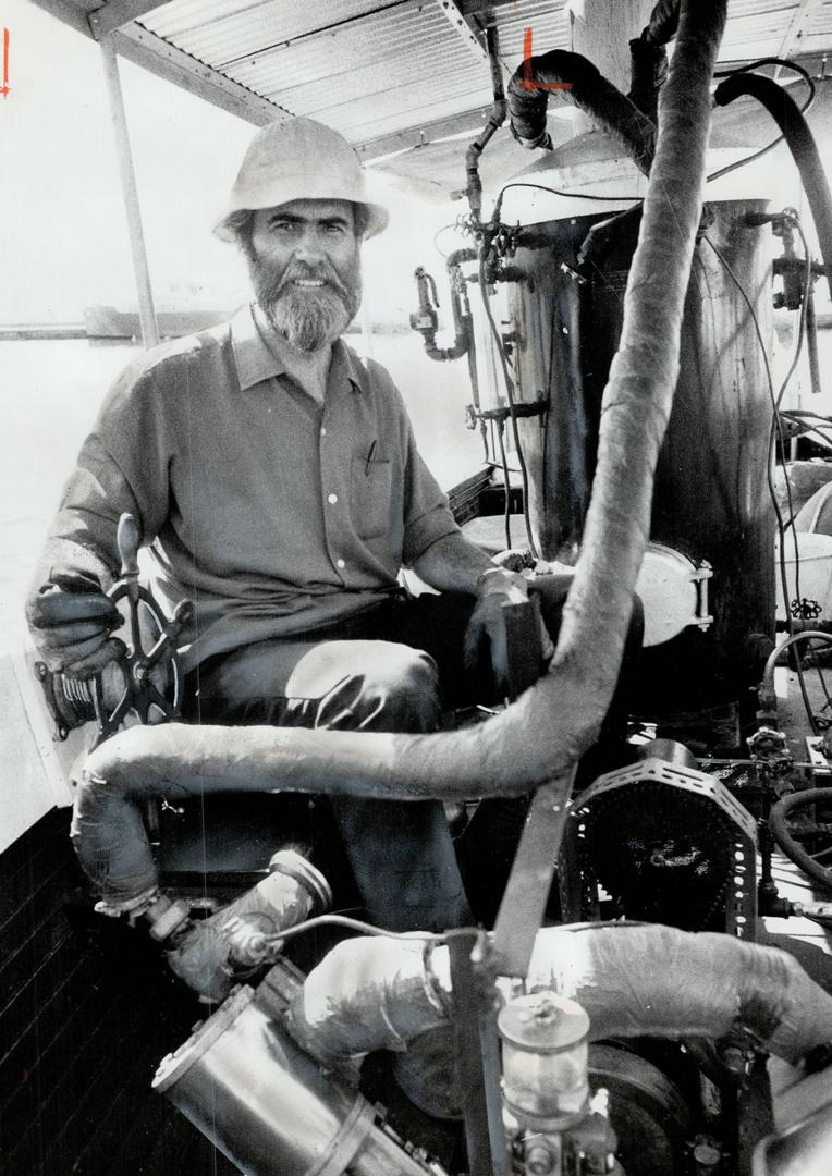 Professor Fred DeLory, (above) who teaches civil engineering at University of Toronto, restored 60-year-old steamboat from a Connecticut estate and it now chugs around Toronto harbor, attaining speeds up to 9 m.p.h. It's still unnamed.