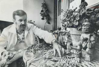 Clive Deverath Looks Over His Indian Artifacts, He'll take collection to England for exhibition at Grosvenor House Hotel