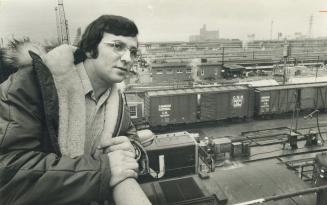Looking over Toronto's railway yards, Sanford Duplassie, 25, left White River in June when CP Rail laid off workers. There's a future here, he says. Only one of his friends has remained in the north. There's nothing there for the younger person. There's no industry. There's nothing. Over half the town is made up of pnsioners. His father is one of them. Sanford's 11 brothers and sisters are scattered across North America, from Texas to British Columbia.