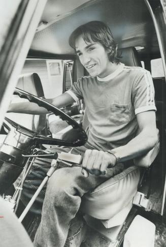 Robert Ellery 18, was crippled by a shot from a .22 rifle. An award from Criminal Injuries Compensation Board enabled the Uxbridge youth to buy this van, equipped with hand controls, wheelchair lift.