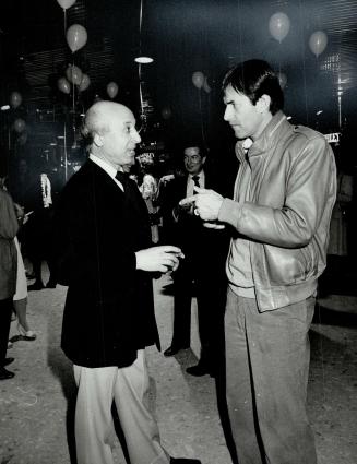 Below right, Paris-born couturier Charles D'Avila talks to real estate broker Ted Beauchamp.