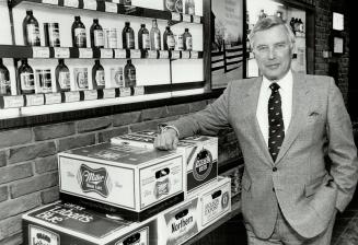 Minding the store: Richard Davidson, Brewers' Warehousing Co. president, says permitting beer to be sold in grocery stores, as suggested by the provincial Liberals, could lead to lost jobs, as well as a rise in beer prices and increased social and ecologi