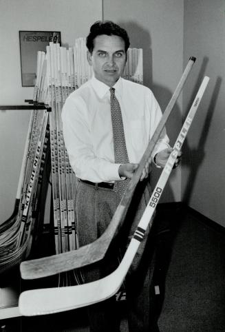 The old and the new: Steven Davies is hoping to revive a familiar name in hockey by marketing a high-tech version of the venerable straight blade Hespeler hockey stick.