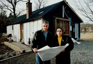 Watershed case: Frank DiFanfilo and wife Stephane Applo, who sought more room for their baby and DiFanfilo's sons, are charged with enlarging their small home in Norval near Silver Creek.